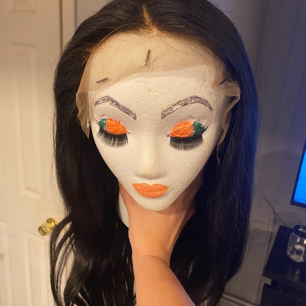 Brazilian straight 20” lace front wig.